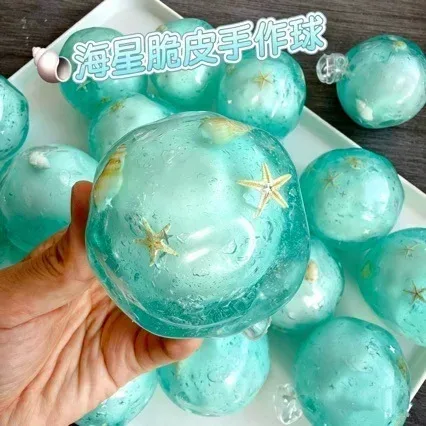Bola antiestresse de cera com som de estalo