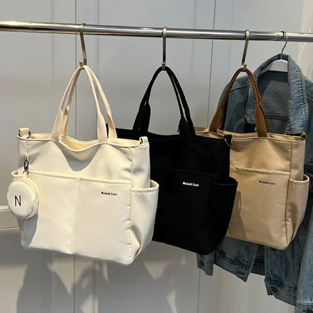 Bolsa tiracolo Modiva impermeável