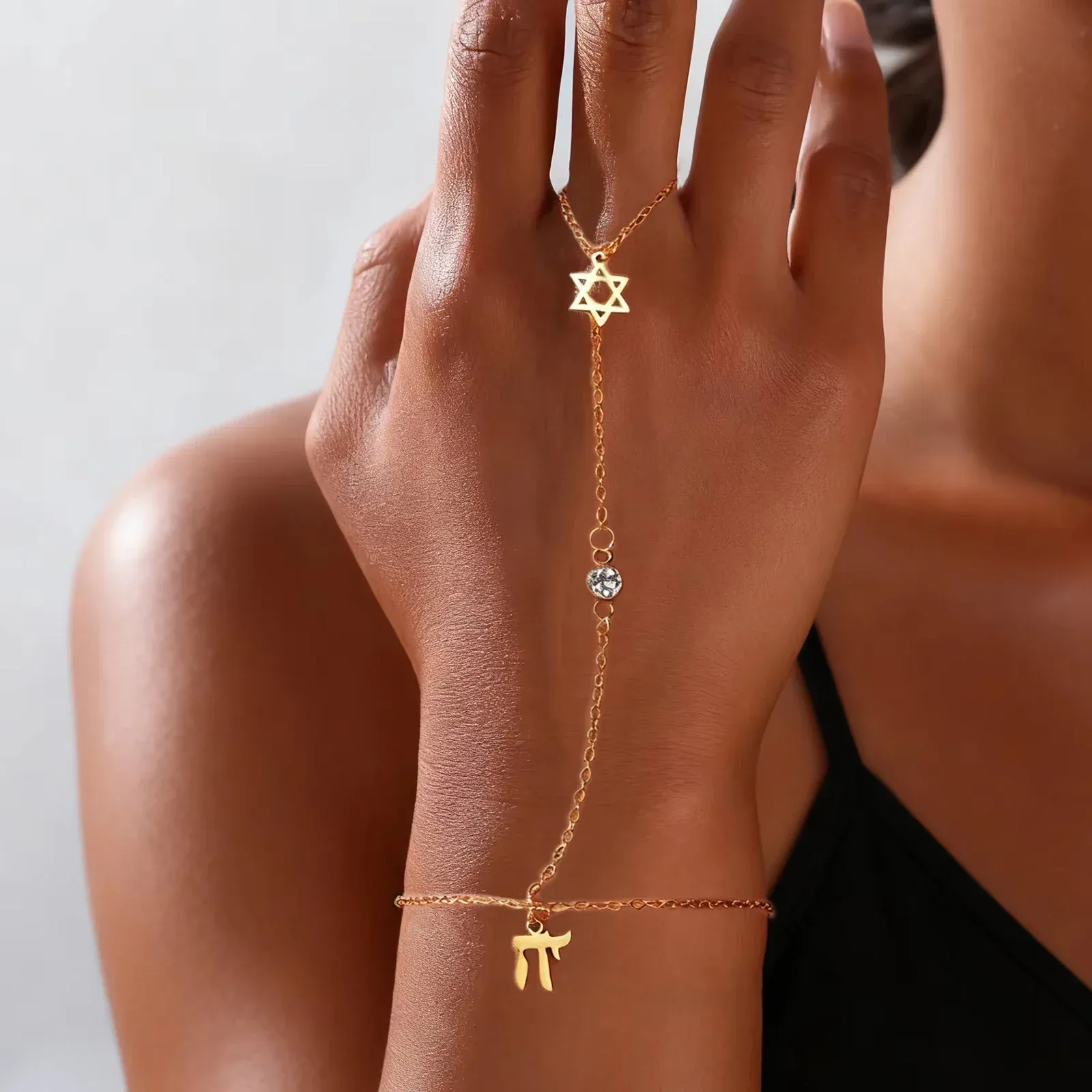 Pulseira de dedo ajustável com estrela de Davi