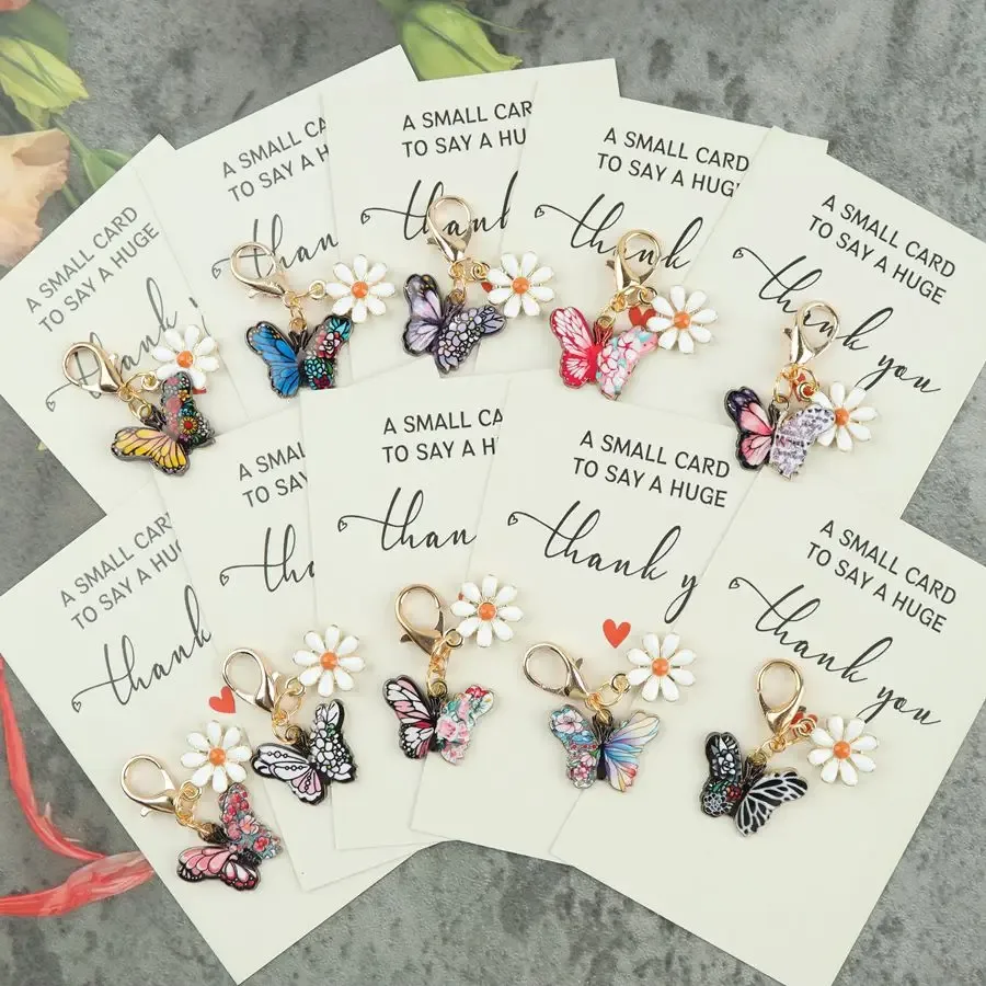 Kit com 10 chaveiros de borboleta e flores
